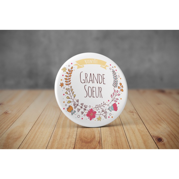 Badge Bientôt Grande Soeur - Couronne de fleurs