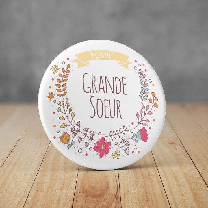 Badge Bientôt Grande Soeur - Couronne de fleurs